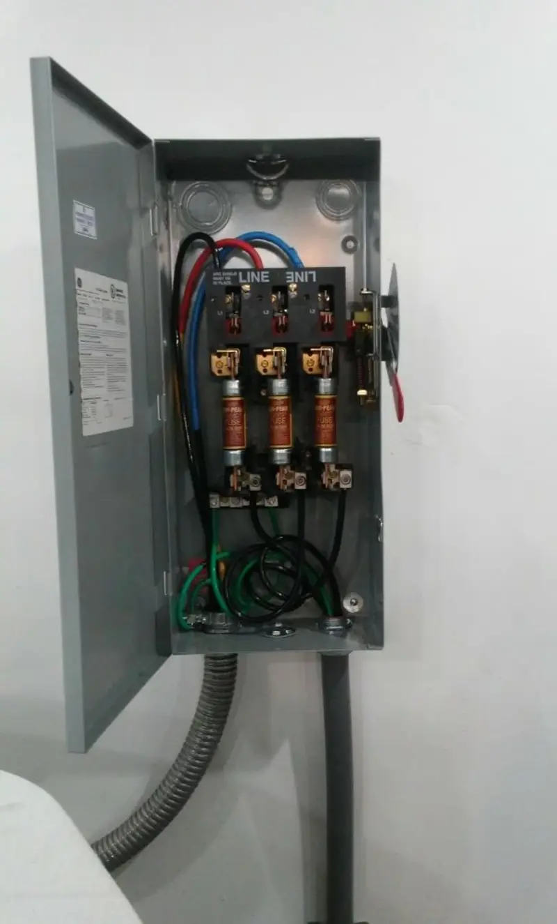 Three-phase disconnect switch installed for Smoke Detector Installation in West Livingston